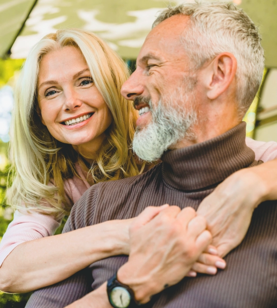 Content older couple showing affection